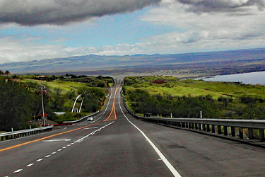 Rolling road under the Clouds